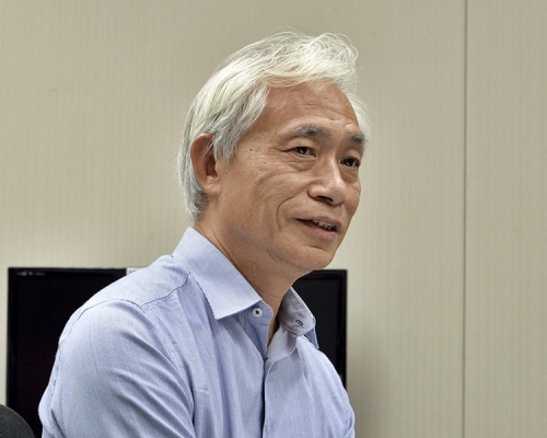 梁耀忠協助受影響保安員追討薪金。資料圖片
