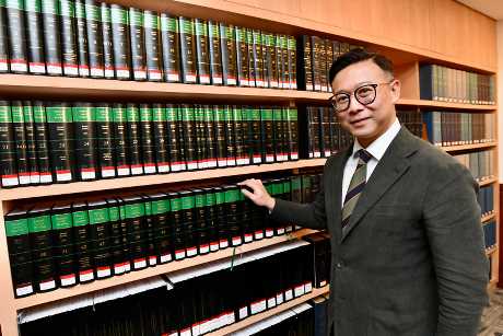 張國鈞講述「律政同行」的成員會積極參與法律專業活動和發展。盧江球攝