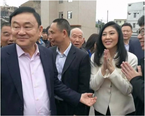 他信和英祿兄妹受到鄉親們的熱烈歡迎。網圖
