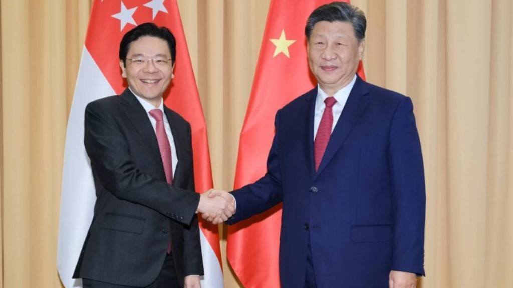 黃循財今日以新加坡總理身份首度訪華，將與國家主席習近平會面。圖為二人2024年在秘魯的合照。新華社