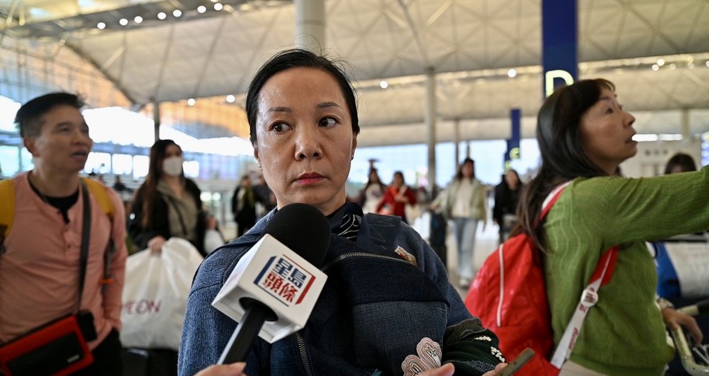 飞往成都的国泰乘客邱小姐表示，之后还会选择国泰航空。锺健华摄