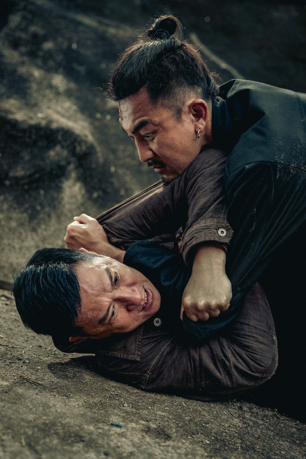 张家辉与谭俊彦在和合石的一场打斗，他说是最辛苦的场面。