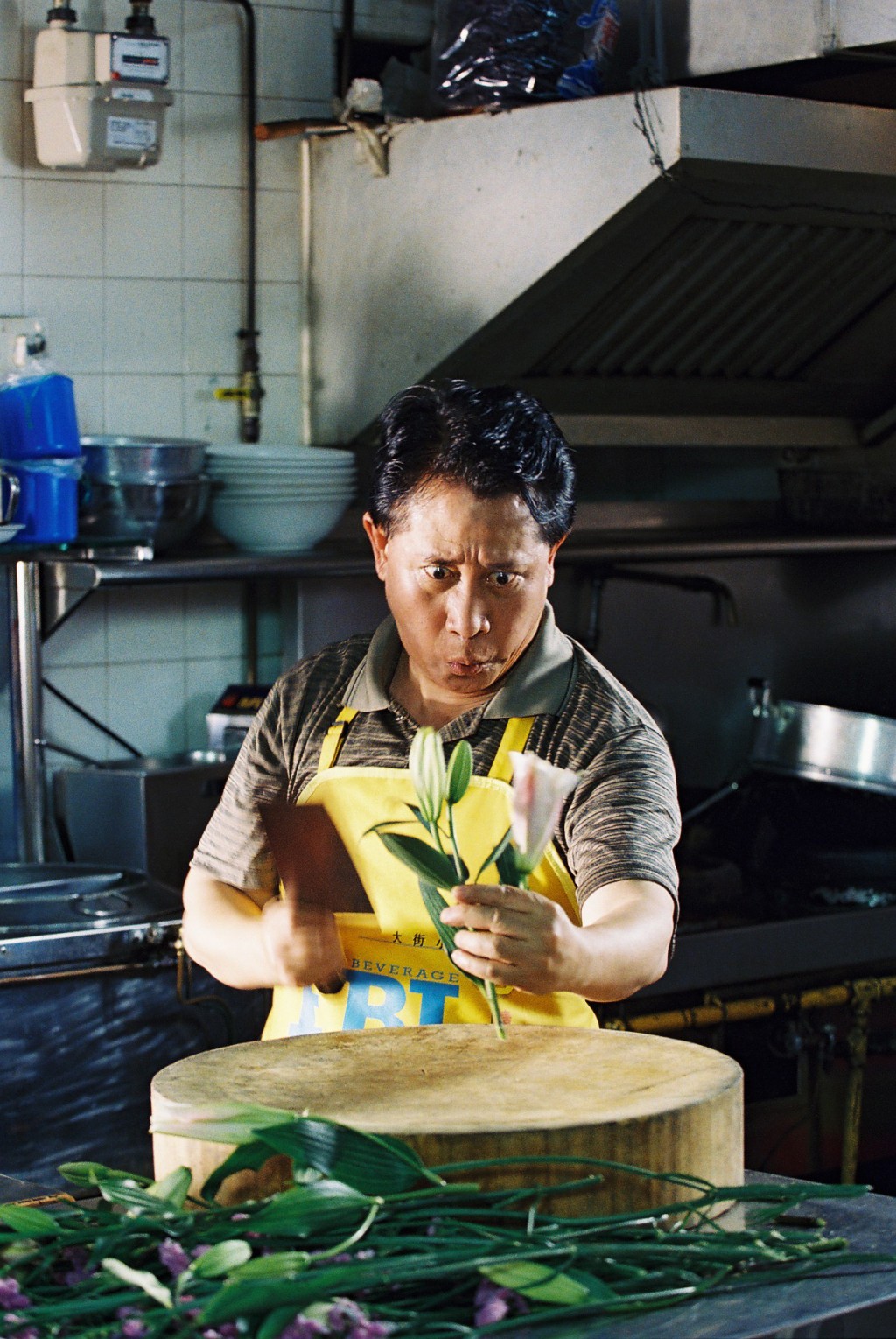 甄文達在電影《海南雞飯》飾演餐廳老闆。