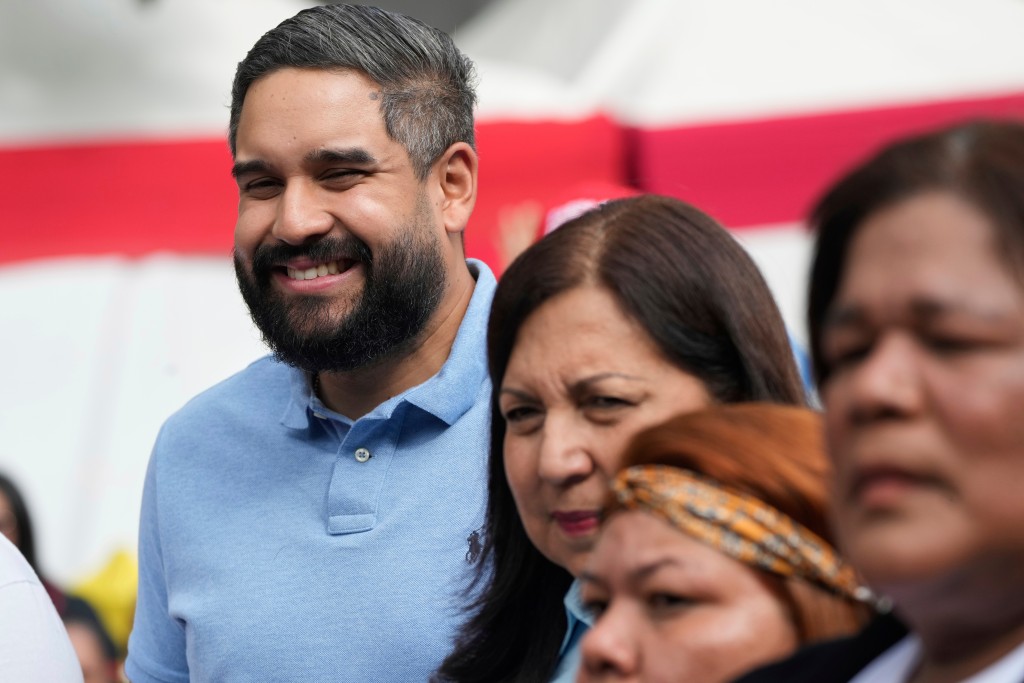 格拉也被美國起訴。美聯社