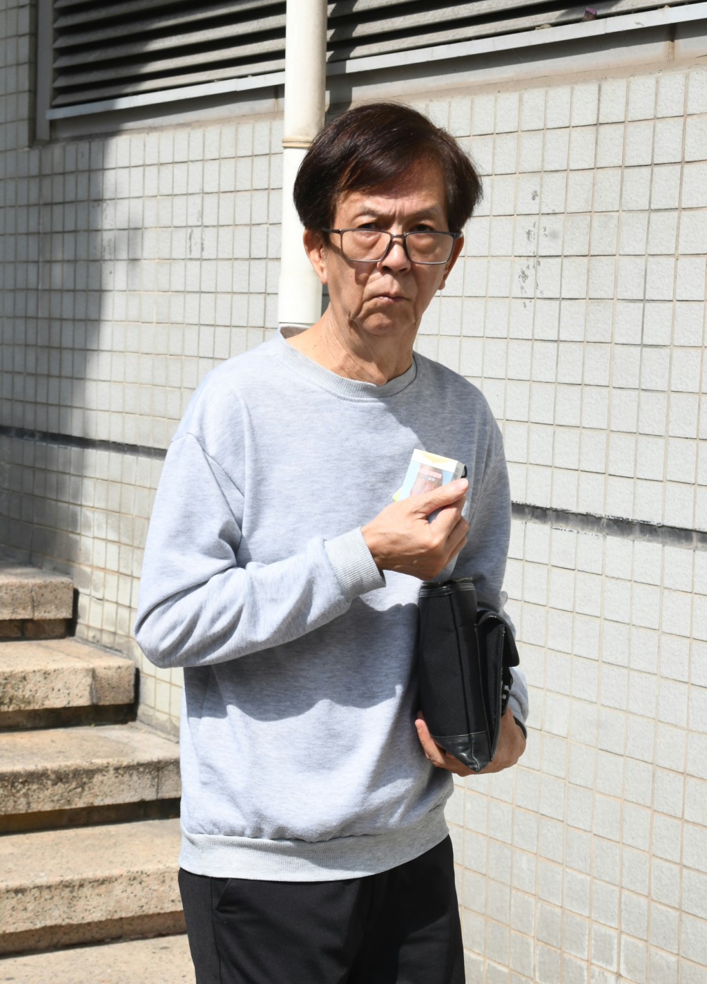 關國培被裁定無禮貌及不守規矩罪成,判處2千元罰款。何健勇攝 關國培被裁定無禮貌及不守規矩罪成,判處2千元罰款。何健勇攝