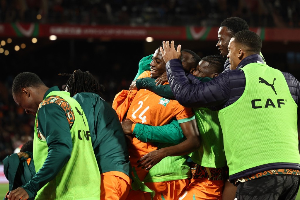 巴索馬拿托尼為科特迪瓦埋齋。法新社