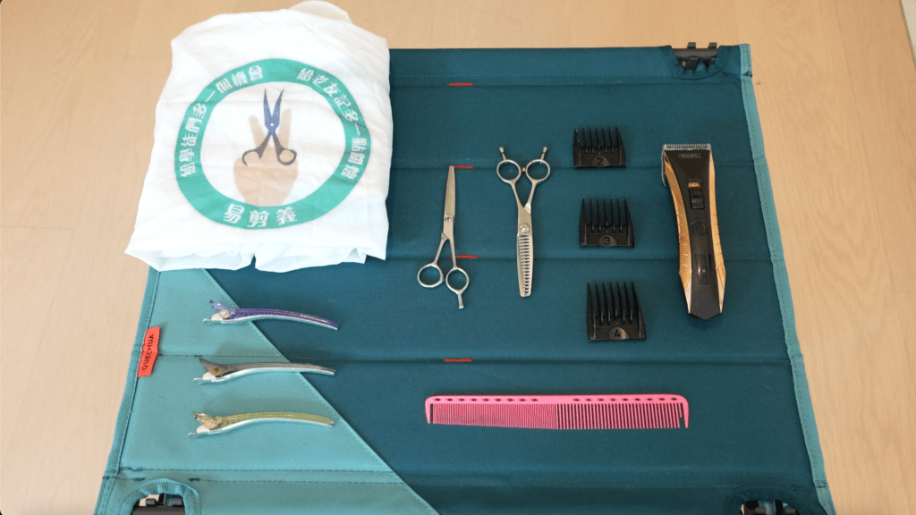 6款剪髮基本工具包括理髮剪刀、牙剪、電剷、圍巾或垃圾膠袋、梳子及髮夾。