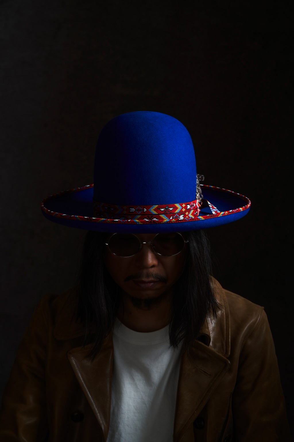 王雙駿說每頂帽都有不同的音樂故事。