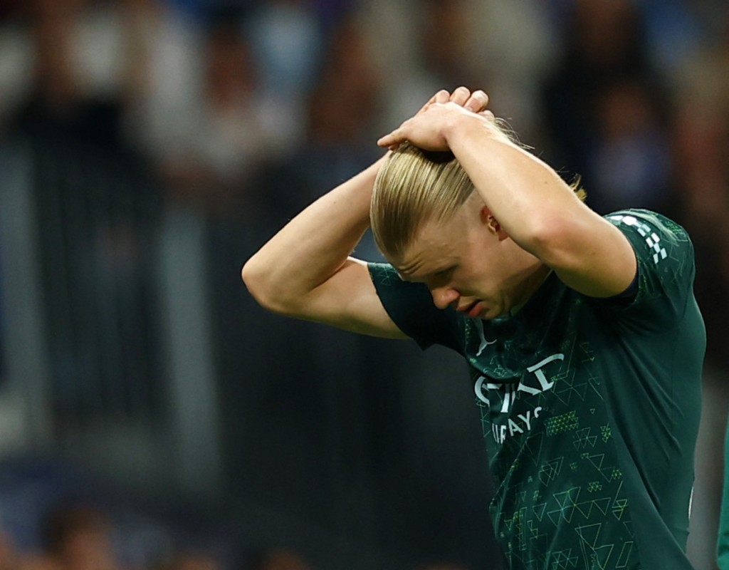 蓝月造访皇家马德里大败0:3，翻盘难度极大。路透社