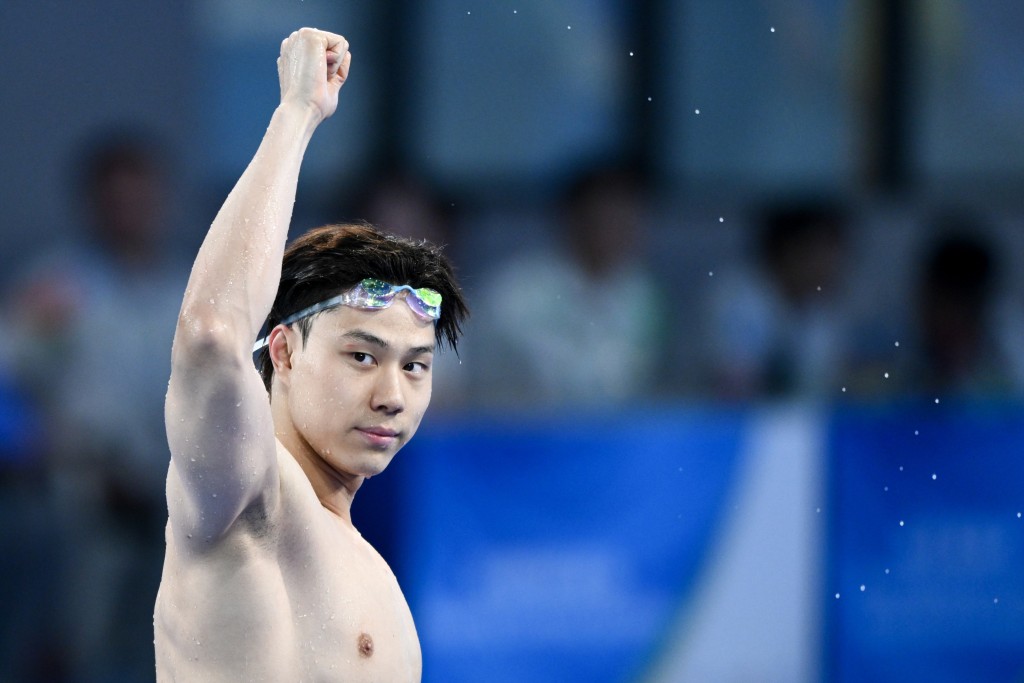 覃海洋将是首位担任亚运会中国体育代表团开幕式旗手的游泳运动员。新华社
