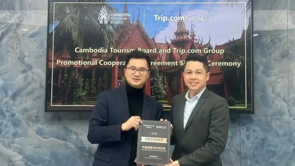 攜程集團副總裁陳冠其與柬埔寨旅遊局CEO金米尼。