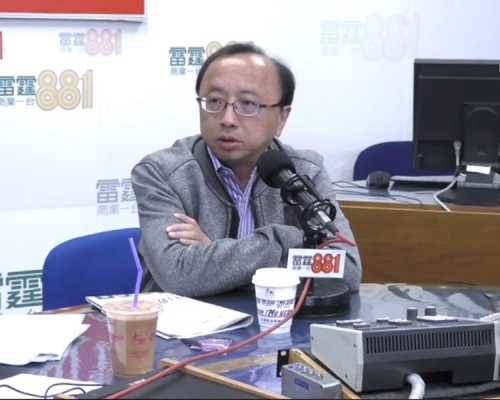 張達明。