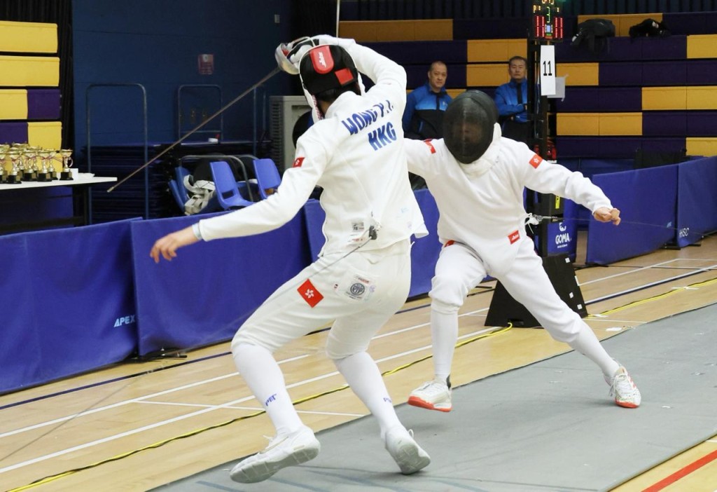 男重「少年組」決賽，黃柏耀（左）以一分不敵陳俊曦（右）。徐嘉華攝