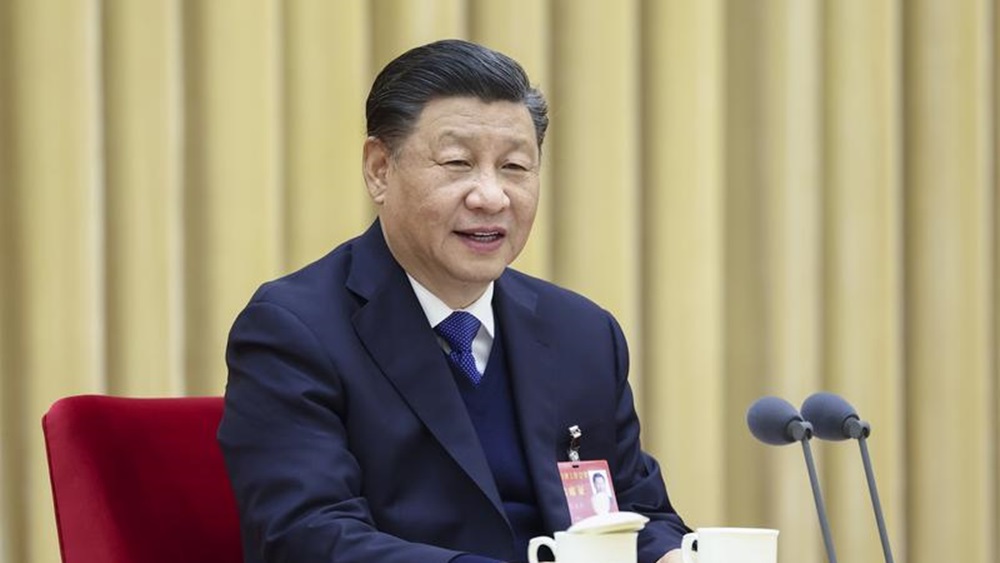 習近平代表中國人民向拜登致電慰問。資料圖片