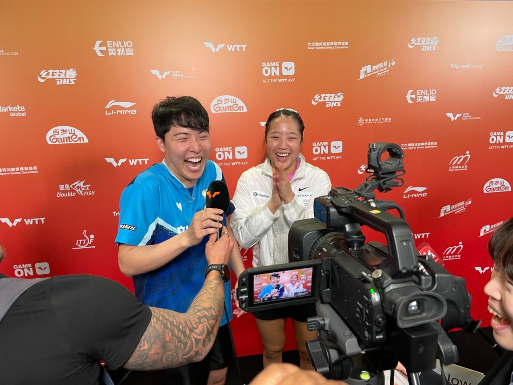 南韓冠軍組合林鐘勳及申裕斌在賽後笑得十分開懷。徐嘉華攝 南韓冠軍組合林鐘勳及申裕斌在賽後笑得十分開懷。徐嘉華攝