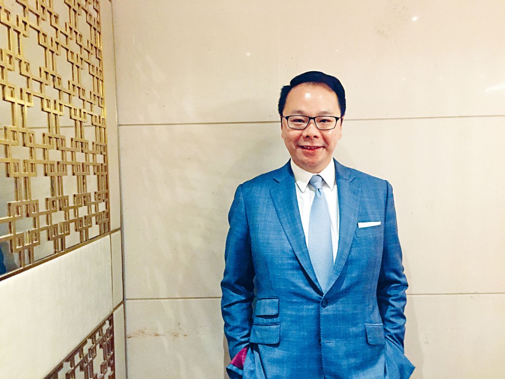 正榮地產執行董事、副總裁兼財務總監陳偉健。