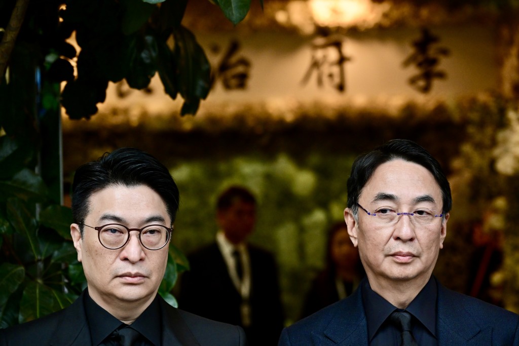 李兆基長子李家傑(右)、二子李家誠(左)。劉駿軒攝 李兆基長子李家傑(右)、二子李家誠(左)。劉駿軒攝