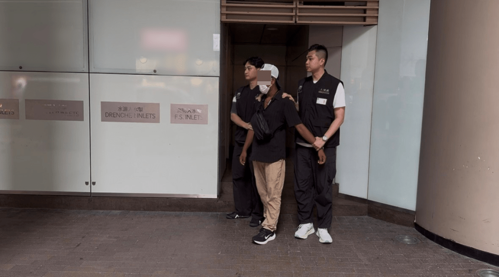 懷疑非法勞工在行動中被捕。政府新聞處圖片