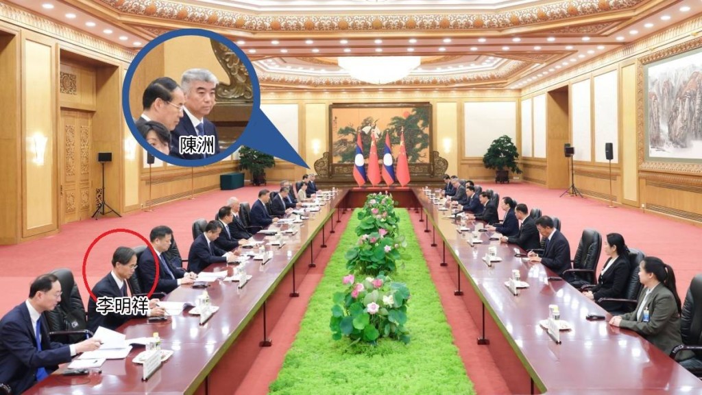 習近平會見老撾領導人通倫時,陳洲的位次在李明祥之後。新華社