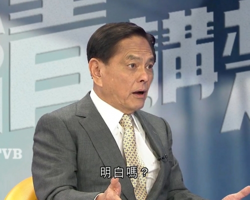 談到23條立法,何柱國以學校考試作例。無綫電視截圖
