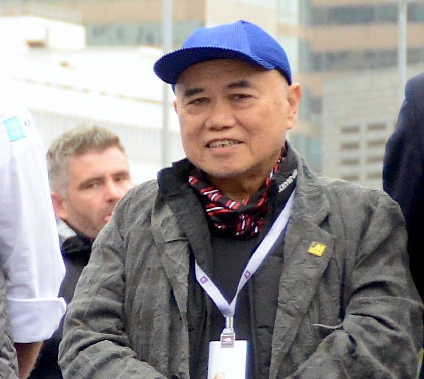 邱達昌夫婦與余錦基在朋友家中飯局。資料圖片