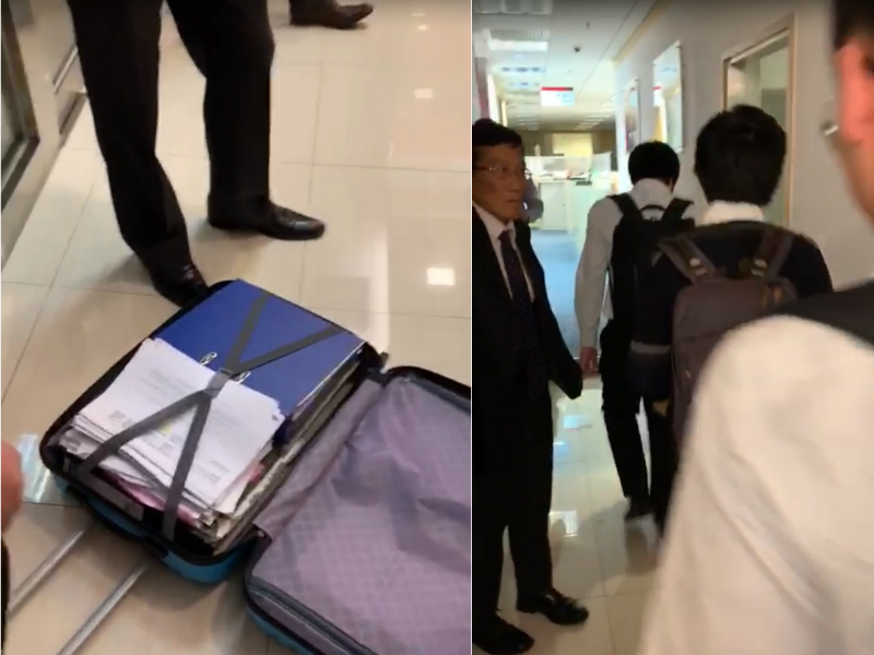 有人企圖帶走文件被阻。影片截圖