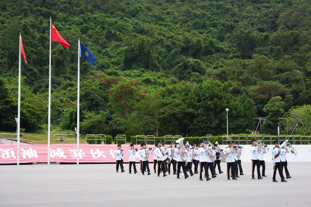 警察銀樂隊的表演為少年警訊周年會操揭開序幕。 警察銀樂隊的表演為少年警訊周年會操揭開序幕。