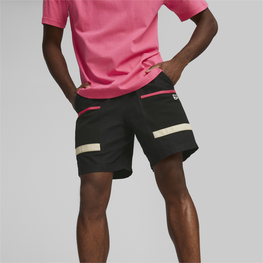 男子梭织运动短裤/$459/Puma。