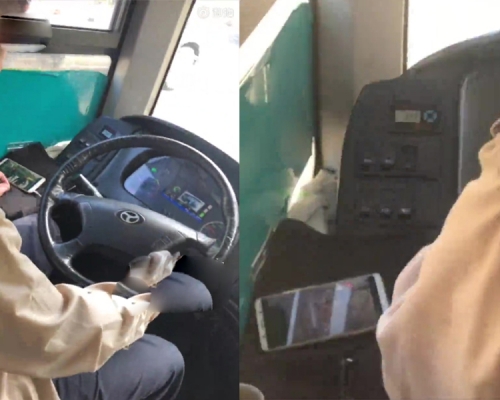 湛江一名巴士司机被乘客揭发一边开车一边透过手机观看电视剧，司机已被停职。(网图)