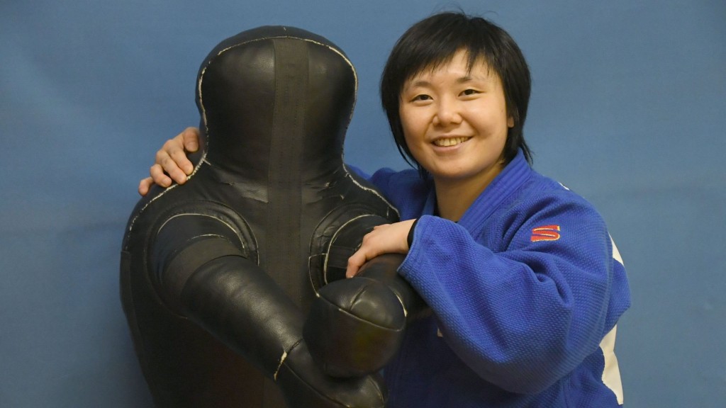 梁寶心治療傷患，只為等待杭州亞運。 本報記者攝