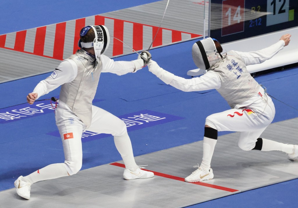 张家朗在男花8强击败吴斌。徐嘉华摄 张家朗在男花8强击败吴斌。徐嘉华摄