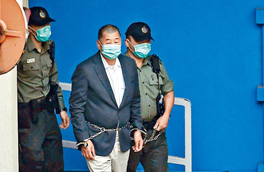 ■多案纏身的黎智英，因前年國慶日非法集結再判囚十四個月。