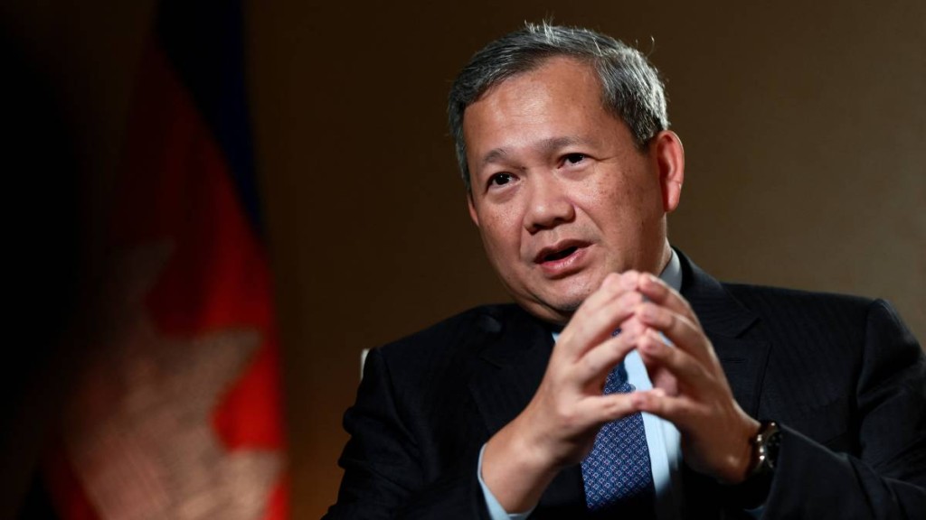 柬埔寨首相洪瑪奈否認事前知道陳志是電騙集團主腦。路透社