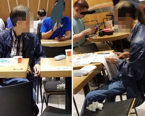中年男子在麥當勞獨霸四人座位來賭馬。「Tai Po 大埔」圖片