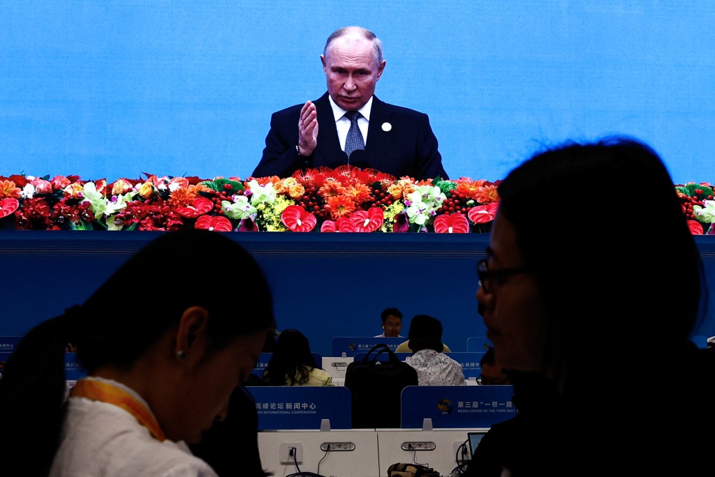 普京在官方未有預告下，在高峰論壇上發表演講。路透社