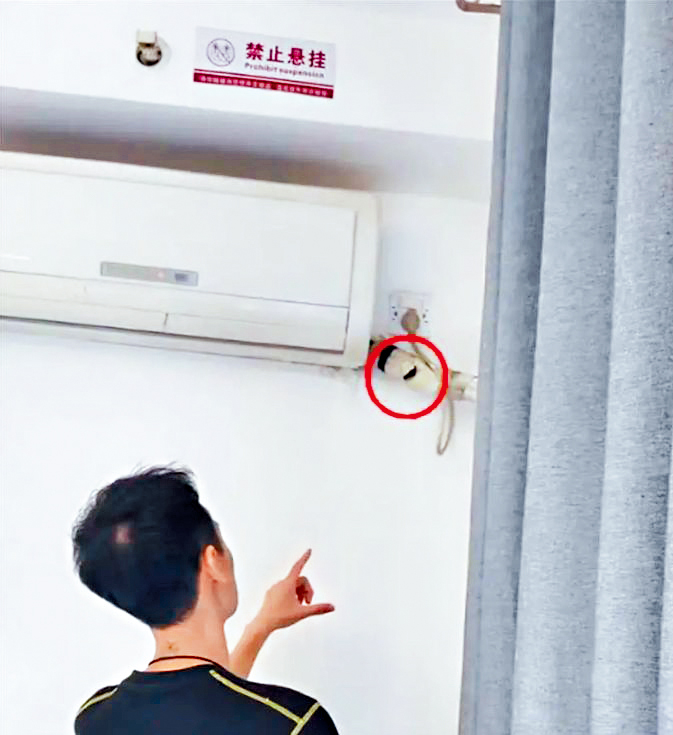 攝像頭安裝在冷氣機和管道連接處。