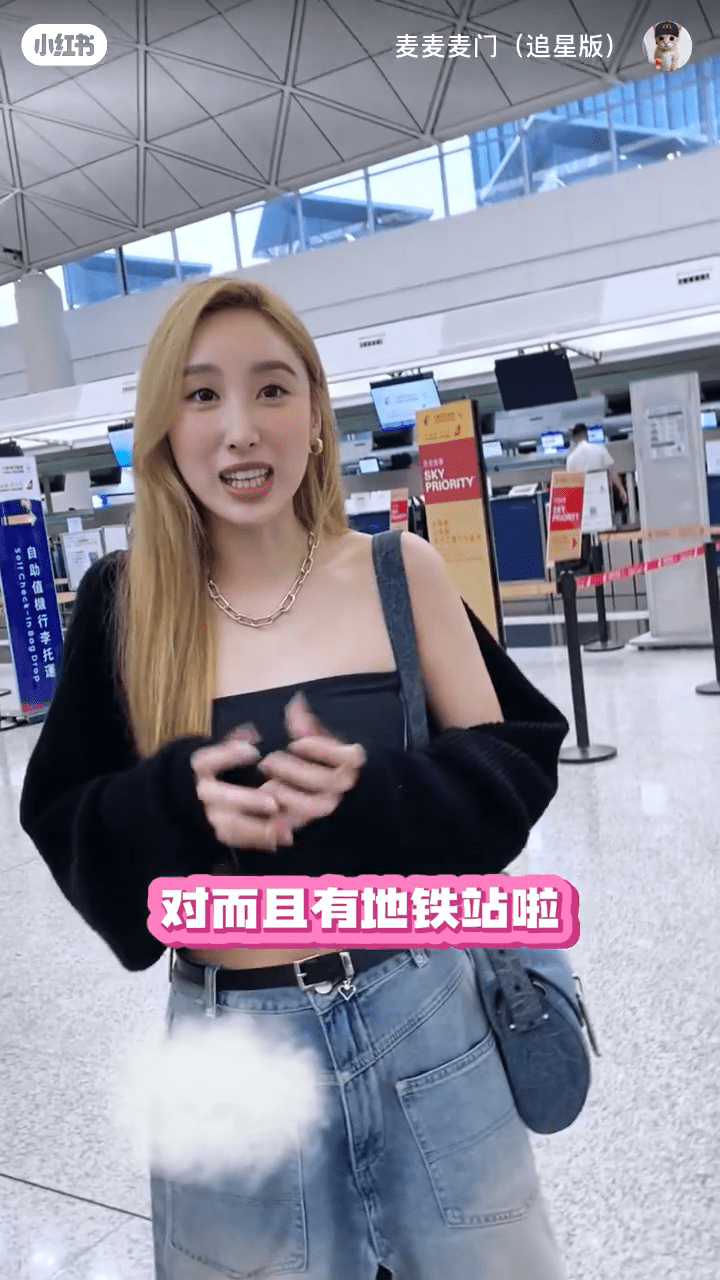 許靖韻指長沙灣物業鄰近地鐵站。 許靖韻指長沙灣物業鄰近地鐵站。