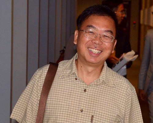 張文光指此行目的是圓父母的遺願。