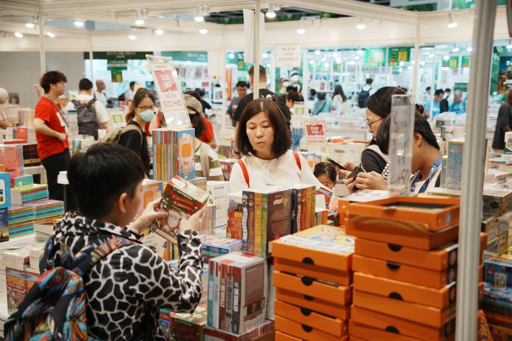 有書商希望通過優惠帶動人流。汪旭峰攝 有書商希望通過優惠帶動人流。汪旭峰攝