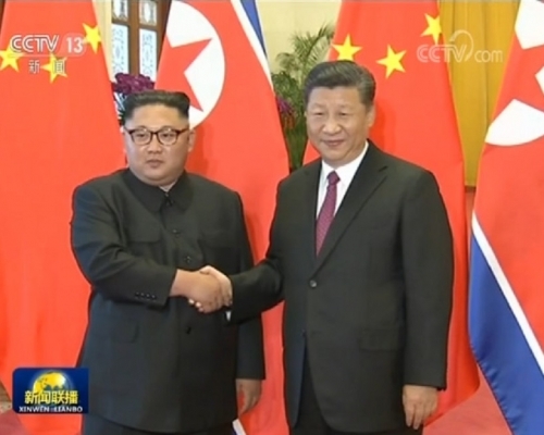 金正恩6月第3度和中國國家主席習近平會面。資料圖片