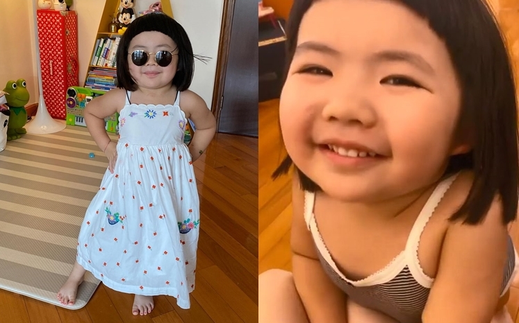 Lucy得知可以出街，開心到擺pose扮model。