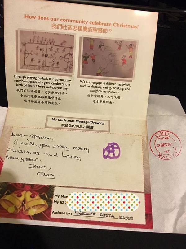 Marco收到助養小孩的聖誕卡。