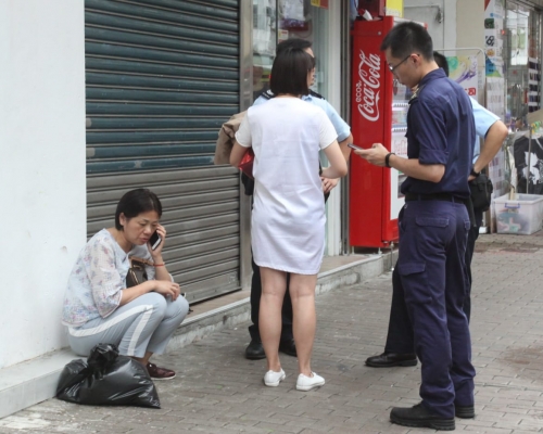 貓主(左)。林思明攝