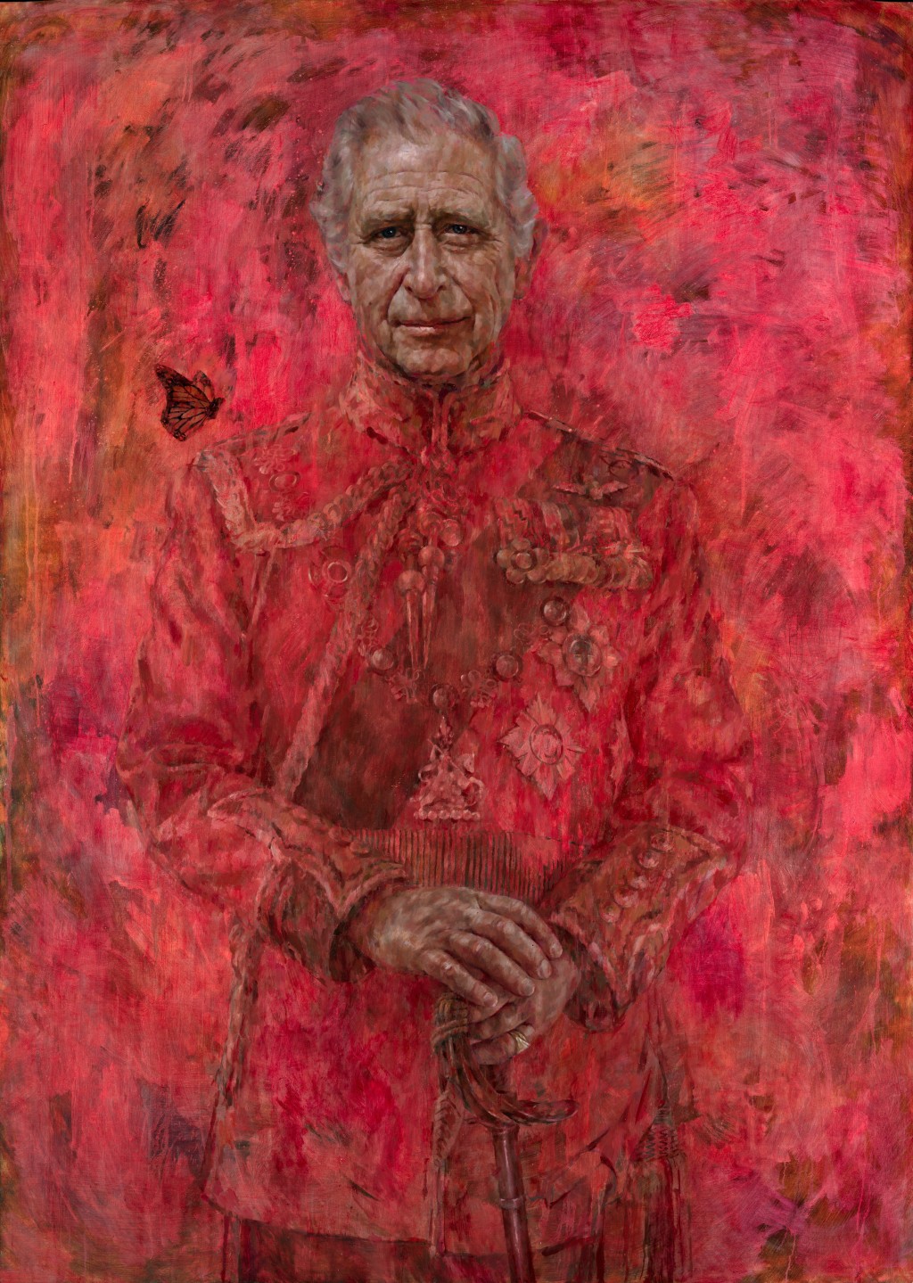 肖像畫以鮮紅色為背景，查理斯身穿紅色的威爾斯衛隊制服，雙手緊握劍柄，一隻蝴蝶在他的右肩上飛舞。路透社