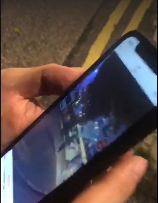 譚文豪指,對方手機有偷拍他的相片。譚文豪FB影片截圖