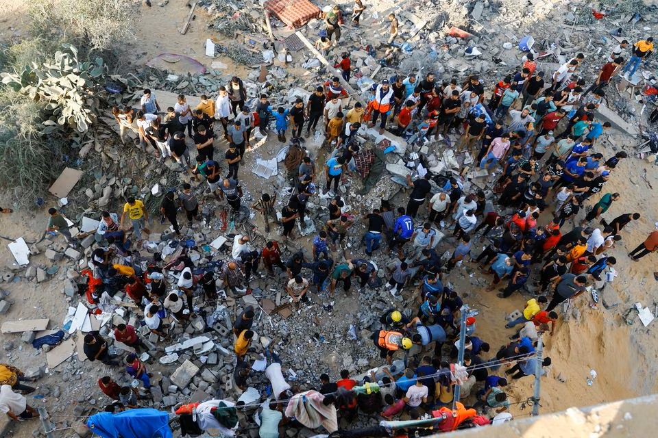 加沙地带内大量平民面对人道危机。路透社