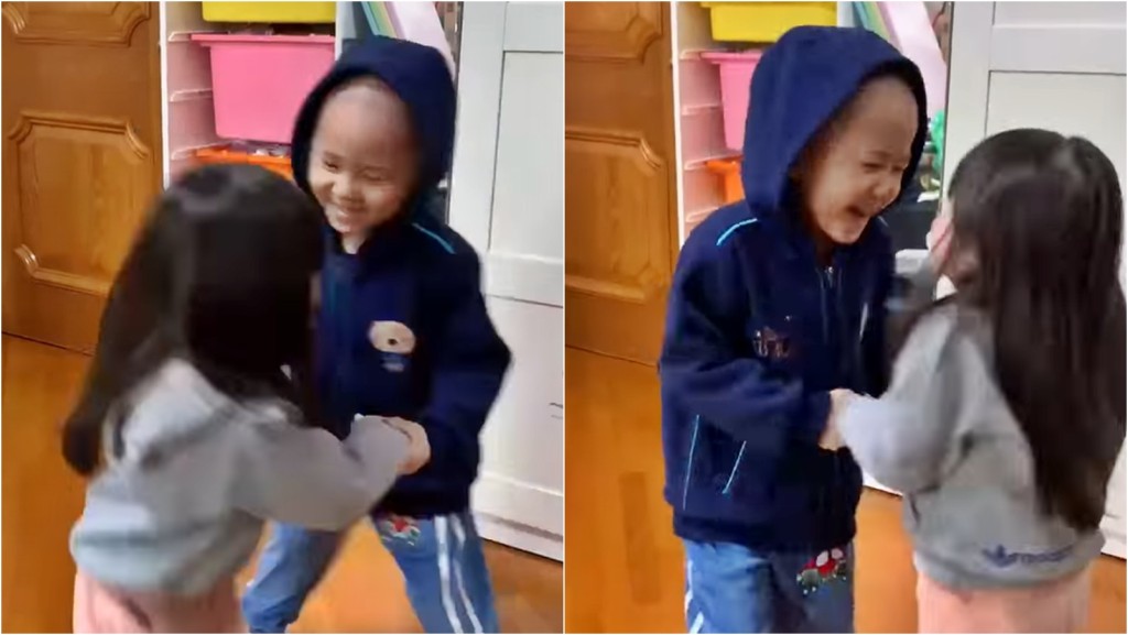 4歲的Sheldon完成隔離回家後,與妹妹開心拖手轉圈。FB影片截圖
