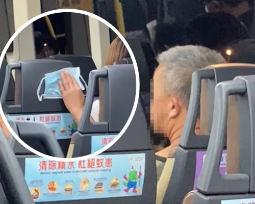 缺德大叔用口罩狂抹椅背。深水埗街坊會FB影片截圖
