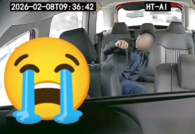 司機將的士停在香港輔警總部。fb車cam L（香港群組）影片截圖