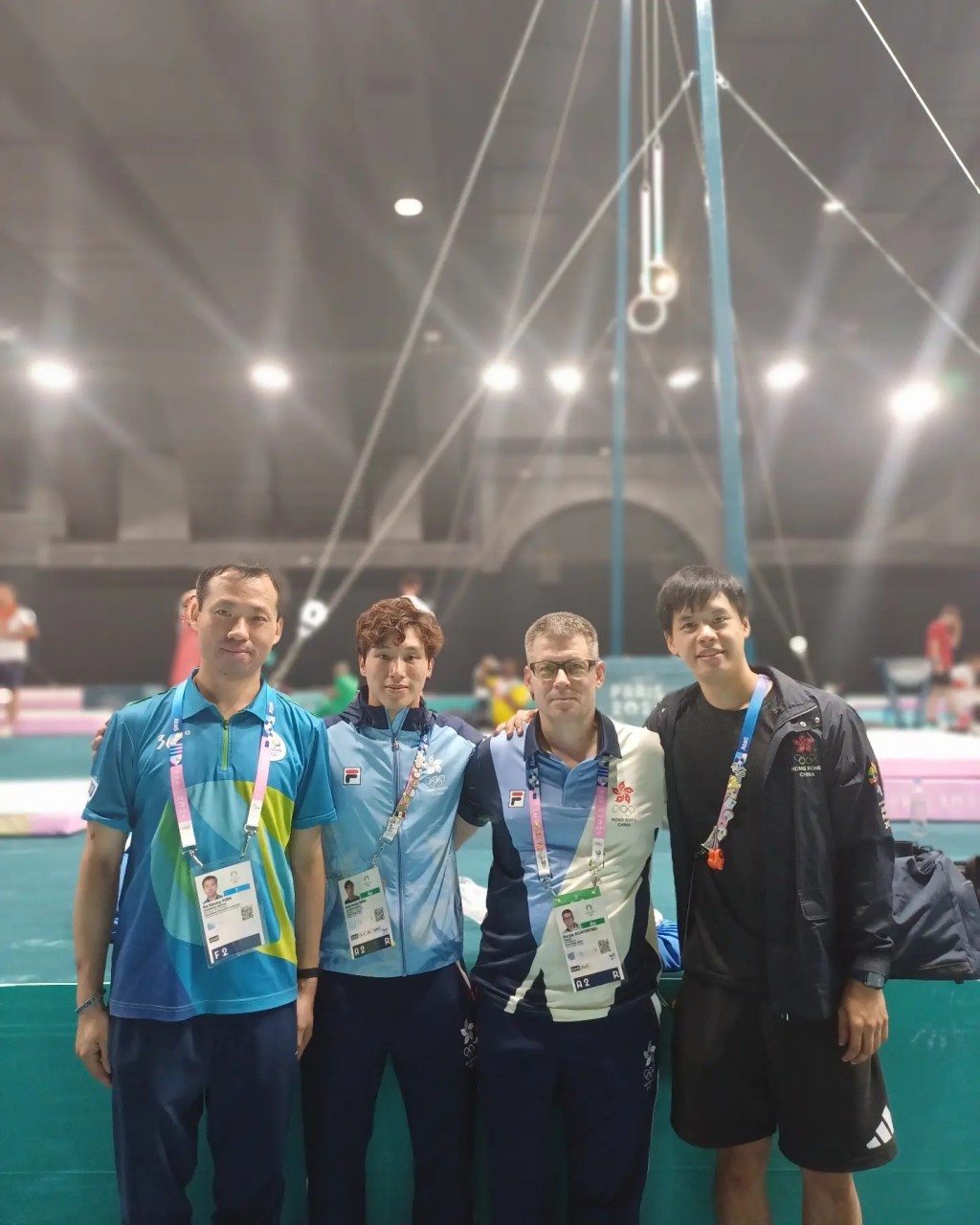 奧運體操裁判袁家強(左起)、石偉雄及塞治教練一起出戰奧運。 網上圖片